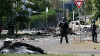 Des gendarmes dans les rues lors des violences à Nouméa, en Nouvelle-Calédonie, le 14 mai 2024