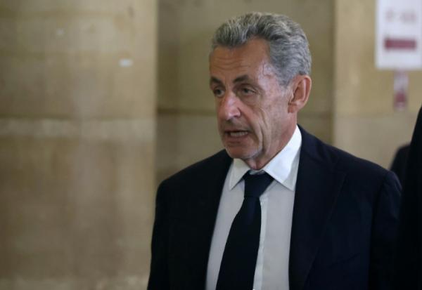 L'ancien président français Nicolas Sarkozy arrive au palais de justice de Paris, le 11 mai 2026, pour son procès en appel dans l'affaire du financement libyen de sa campagne présidentielle de 2007