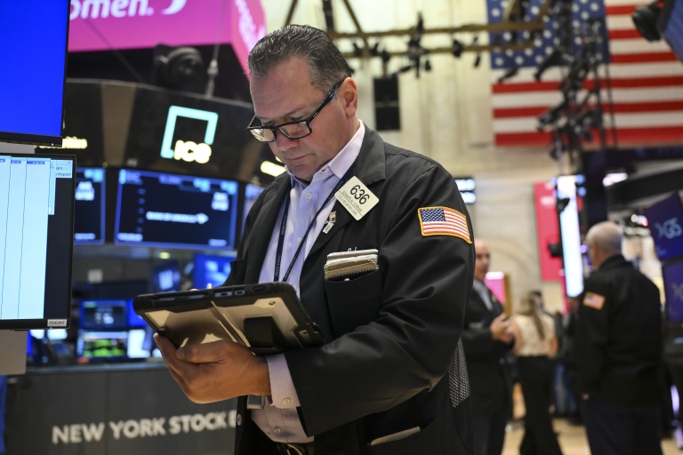 Trader sur le parquet du New York Stock Exchange (NYSE) le 19 octobre 2026.