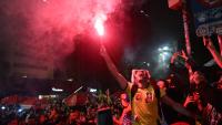 Un partisan du président Luiz Inacio Lula da Silva célèbre l'annonce des résultats du second tour de l'élection présidentielle à Rio de Janeiro, au Brésil, le 25 octobre 2026