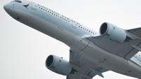 Un avion de la compagnie honkongaise Cathay Pacific juste après son décollage à l'aéroport international de Hong Kong international airport le 11 mars 2026