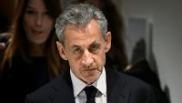 L'ancien président Nicolas Sarkozy, accompagné de son épouse Carla Bruni, quitte le tribunal de Paris après le verdict du procès libyen pour financement illégal de sa campagne de 2007, le 25 septembre 2025