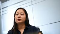 La Sud-Coréenne Baek Song-yi, qui fait campagne pour le droit des victimes de harcèlement au travail, le 17 juillet 2026 à Séoul