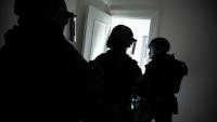 Des membres du RAID participent à un exercice d'entraînement à la libération d'otages, au quartier général du RAID, à Bièvres, dans la banlieue sud de Paris, le 8 octobre 2025