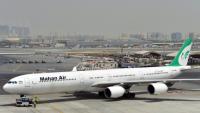 Un avion de la compagnie iranienne Mahan Air sur le tarmac de l'aéroport de Dubaï le 14 septembe 2017
