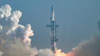 La fusée Starship 39 de SpaceX décolle de Starbase lors du 12e vol d’essai, vu depuis South Padre Island, au Texas, le 22 mai 2026