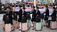 Les joueuses du club féminin nord-coréen Naegohyang sont arrivées à l'aéroport international d'Incheon, le 17 mai 2026, en vue de la demi-finale de la Ligue des champions asiatique féminine qui les opposera au club féminin sud-coréen Suwon FC. 