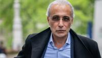 Le prédicateur suisse Tariq Ramadan arrive au palais de justice de Genève le 24 mai 2023, pour le verdict de son procès pour "viol et contrainte sexuelle"