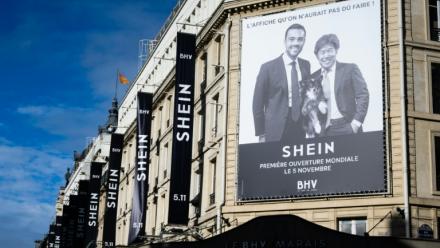 Publicité sur une façade du Bazar de l'Hotel de Ville (BHV) à Paris, le 3 novembre 2025, annonçant l'ouverture d'un espace Shein pour le 5 novembre  