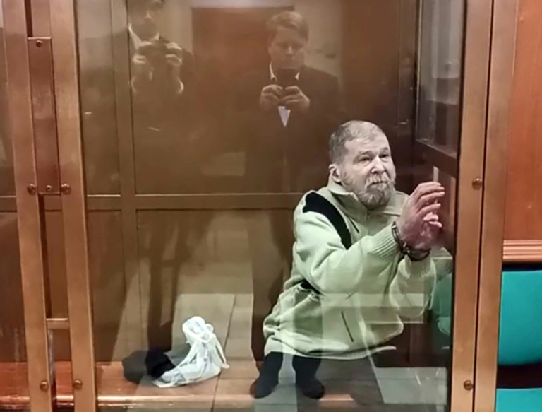 Image tirée d'une séquence fournie par le service de presse du tribunal municipal de Moscou, le 7 octobre 2024, montrant l'Américain Stephen Hubbard, accusé d'avoir combattu en tant que mercenaire pour l'Ukraine, lors d'une audience consacrée à son verdict, à Moscou