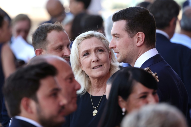 La candidate RN à l'élection présidentielle Marine Le Pen et le président du parti Jordan Bardella à Nice dans les Alpes-Maritimes le 14 juillet 2026