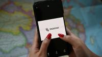 Le logo de Manus sur un téléphone portable, à Pékin, le 28 avril 2026