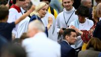 La candidate RN à la présidentielle Marine Le Pen et le président du parti Jordan Bardella à leur arrivée à la messe célébrée par le pape Léon XIV à Paris le 26 septembre 2026