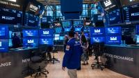 Traders sur le parquet du New York Stock Exchange (NYSE) le 11 juin 2026 à New York.