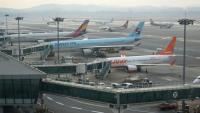 Des avions sur le tarmac de l'aéroport de Séoul, le 13 novembre 2025, en Corée du Sud