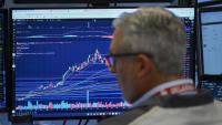 Un tradeur à la Bourse de New York le 24 août 2026