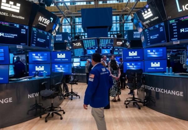 Traders sur le parquet du New York Stock Exchange (NYSE) le 11 juin 2026 à New York.