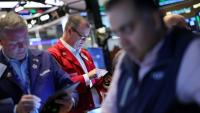 Traders, à l'ouverture sur le parquet du New York Stock Exchange le 12 mai 2025. 