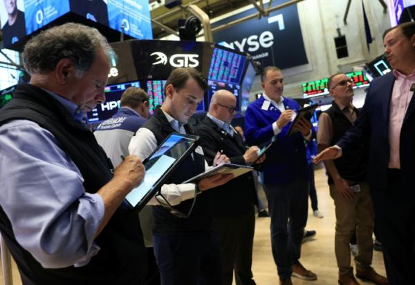 Des traders à Wall Street à New York, le 16 septembre 2026