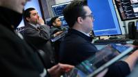 Traders sur le parquet du New York Stock Exchange le 1er mai 2026 à New York.