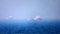 Des navires près du détroit d'Hormuz au large de Khor Fakka, sur la côte est des Emirats arabes unis, le 13 juillet 2026
