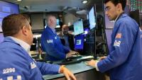 Traders sur le parquet du New York Stock Exchange, le 14 septembre 2026.