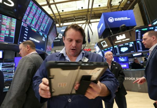 Des opérateurs à la Bourse de New York le 20 avril 2026.