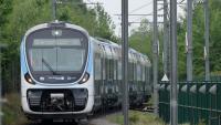 Première sortie d'usine du train MI20 construit par Alstom et CAF, qui remplacera pour la SNCF et la RATP les vieilles rames du RER B francilien, à Crespin (nord) le 7 mai 2026
