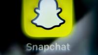 Vue du logo de l'application Snapchat sur un téléphone, le 3 avril 2024 à Francfort-sur-le-Main en Allemagne