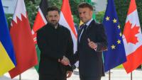 Le président Emmanuel Macron (d) et le président ukrainien Volodymyr Zelensky au sommet du G7 à Evian, le 16 juin 2026