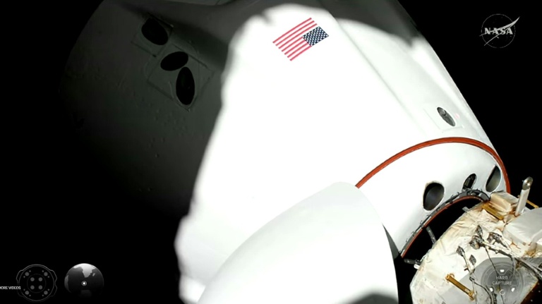 Image tirée d'une diffusion en direct de Nasa montrant l'équipage Crew-12 s'approchant de la Station spatiale internationale (ISS), le 14 février 2026
