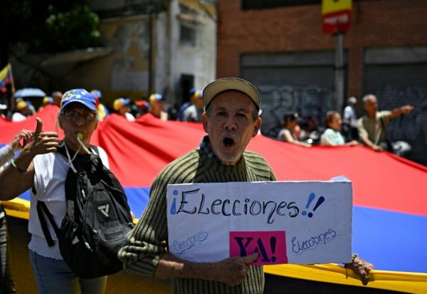 Des manifestants se rassemblent à Caracas le 28 juillet 2026, en vue de demander des élections au Venezuela