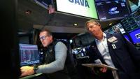 Des opérateurs à la Bourse de New York le 19 mai 2026