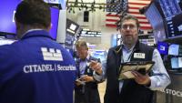 Des opérateurs à la Bourse de New York le 27 mai 2026