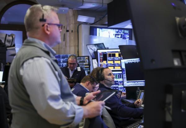 Des opérateurs à la Bourse de New York le 11 mai 2026