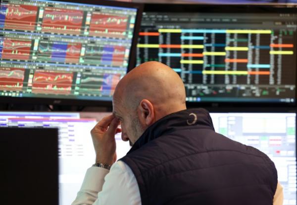 Un opérateur à la Bourse de New York, le 14 mai 2026