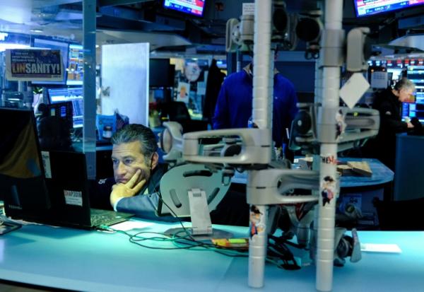 Un opérateur à la Bourse de New York, le 16 décembre 2025