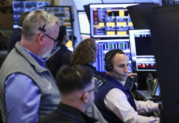 Des opérateurs à la Bourse de New York le 27 mai 2026