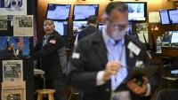 Des opérateurs à la Bourse de New York le 18 juillet 2025