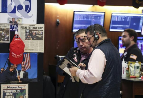 Des opérateurs à la Bourse de New York le 21 novembre 2025