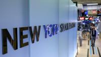 Des opérateurs à la Bourse de New York, le 18 mars 2026
