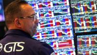 Un opérateur à la Bourse de New York, le 13 octobre 2025