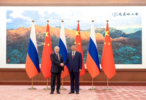 Le président chinois Xi Jinping reçoit son homologue russe Vladimir Poutine à Pékin, le 20 mai 2026