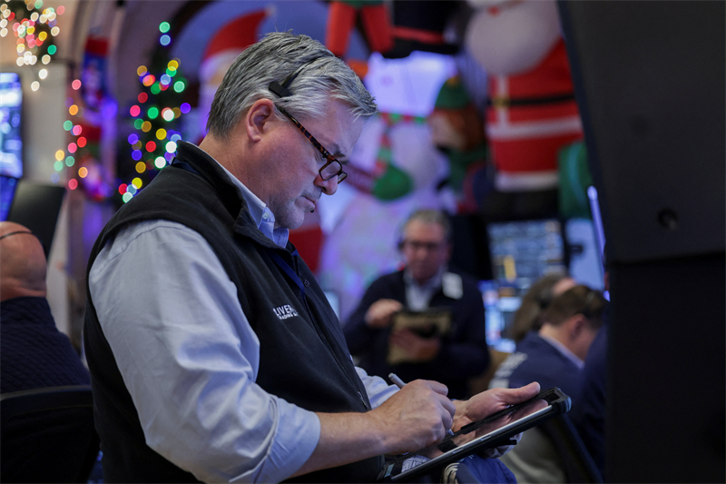 Wall Street repasse dans le rouge en attendant les "stats"