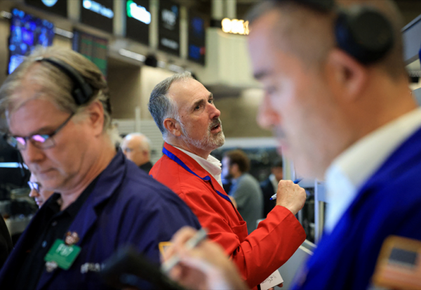 Wall Street retombe, en attendant la Fed, Microsoft et Meta