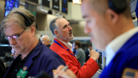 Wall Street retombe, en attendant la Fed, Microsoft et Meta