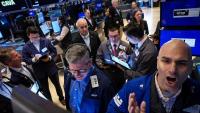Wall Street termine en légère baisse après avoir battu des records historiques en séance